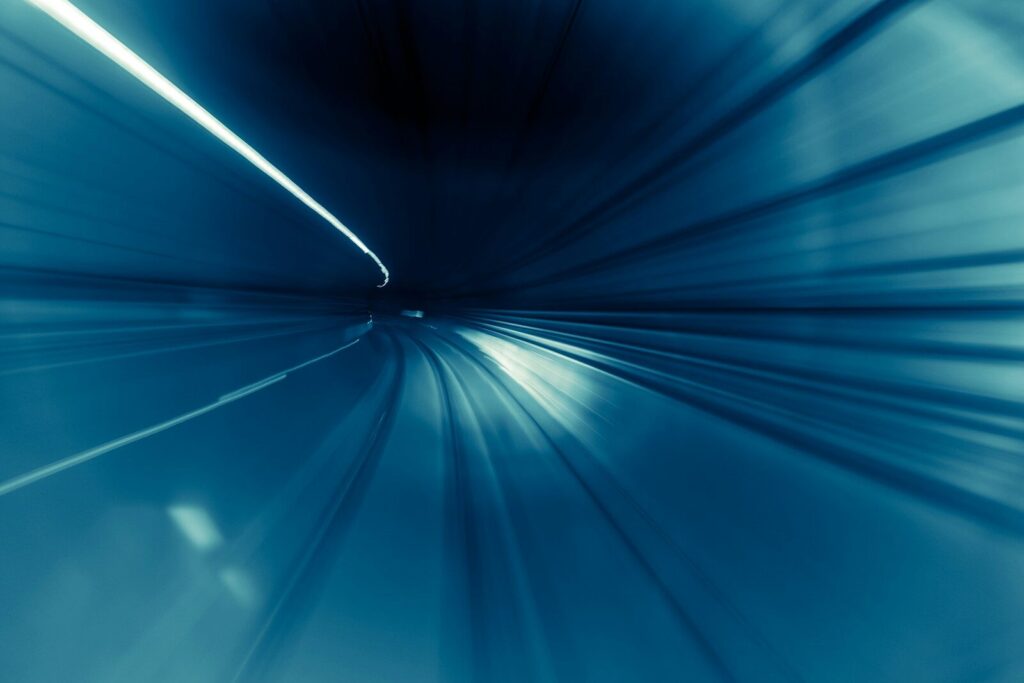 a very blurry photo of a tunnel in the sky